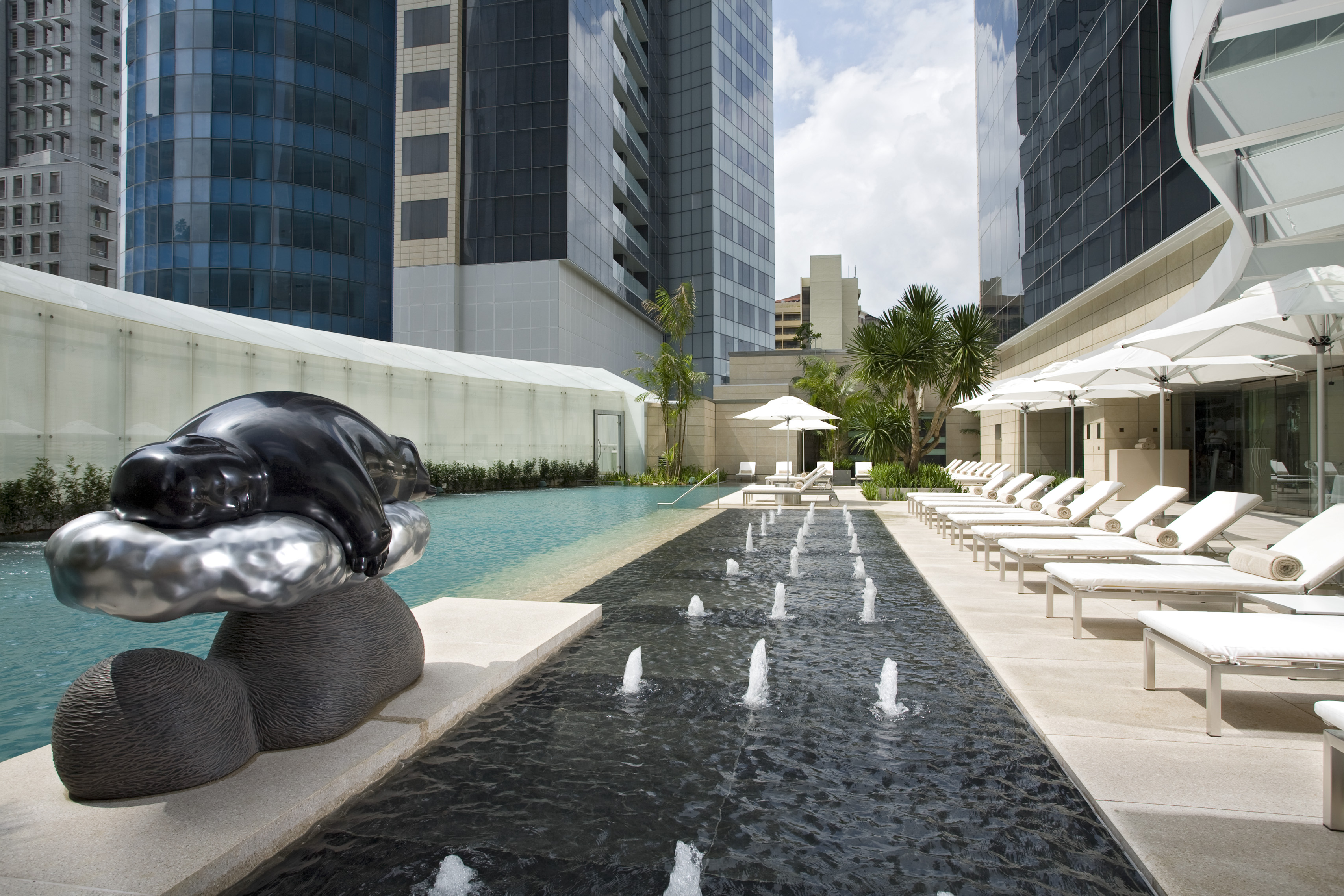 Enjoy moments of calm and serenity at the Poolside ink St Regis Singapore